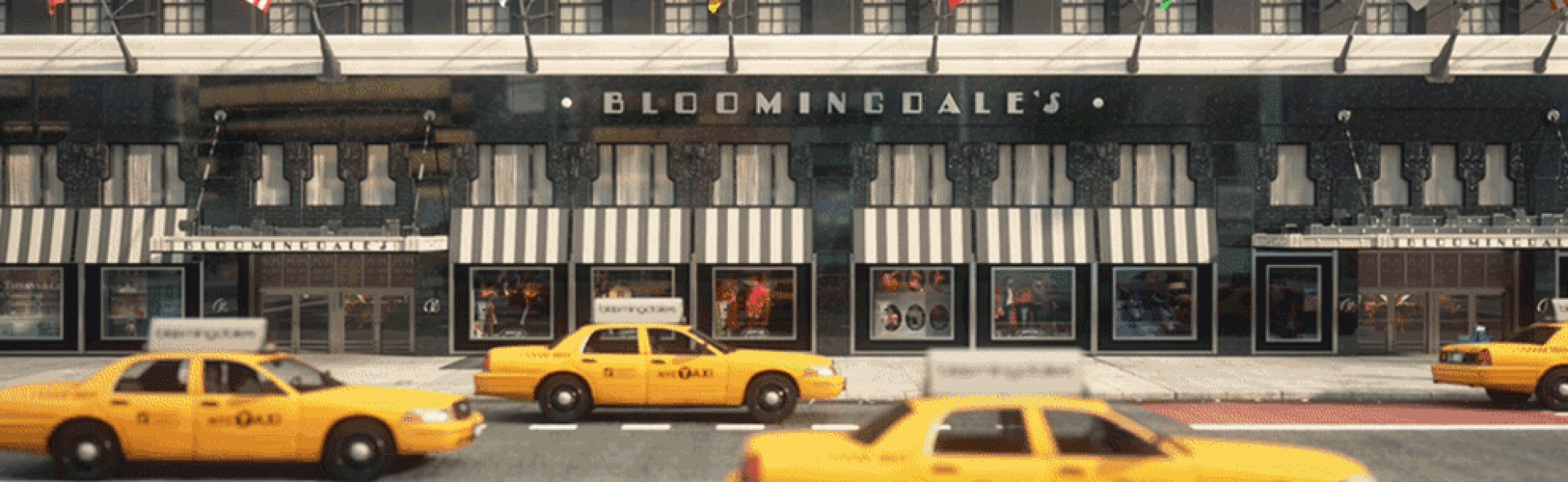 Bloomingdale's store entrance with yellow taxis.