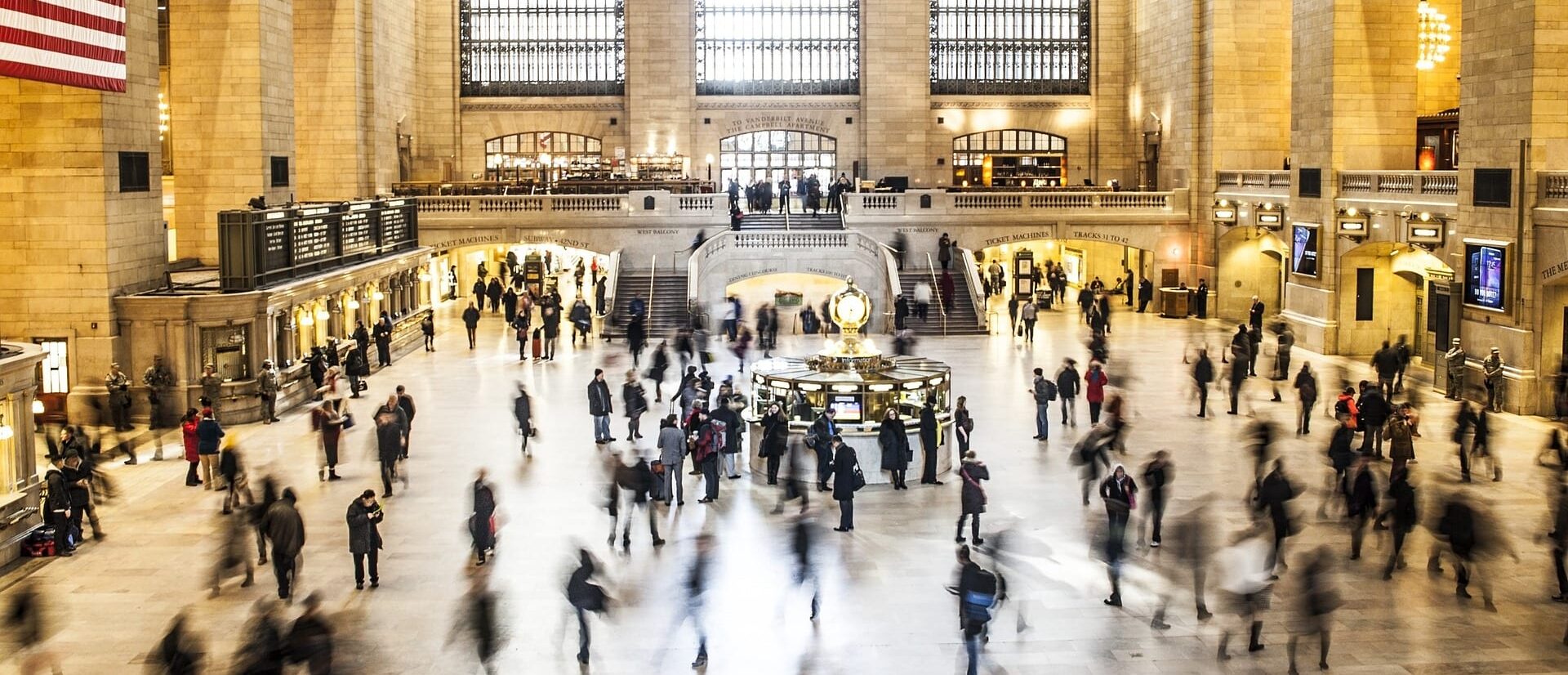 People walking inside Grand Central Terminal.