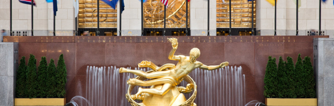 Prometheus statue at Rockefeller Center with fountain backdrop.