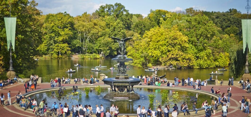 Bethesda Fountain in Central Park with visitors.