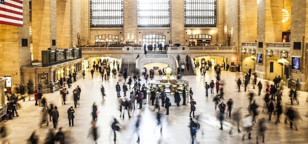 People walking inside Grand Central Terminal.