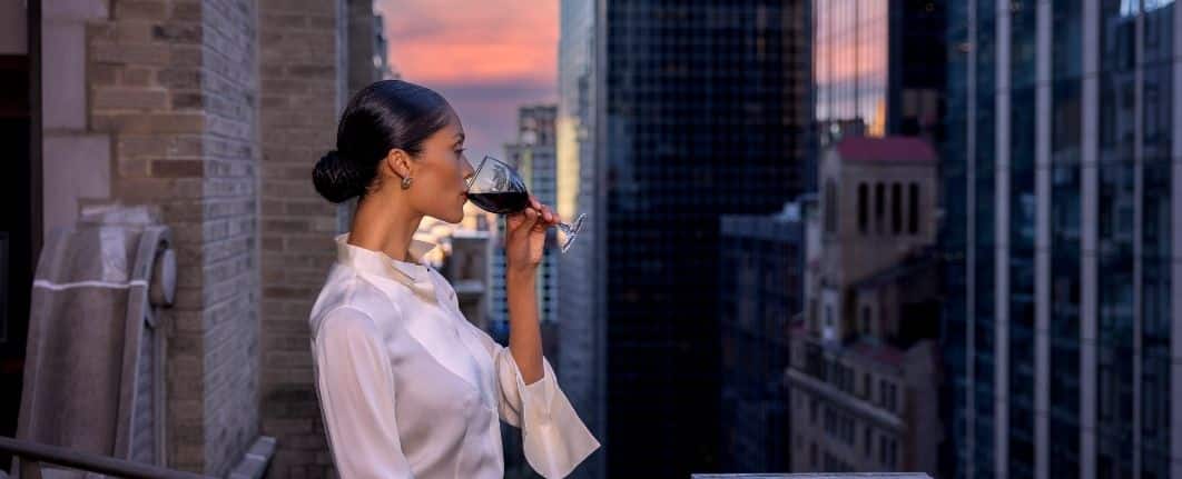 Woman on terrace at The Benjamin Royal Sonesta